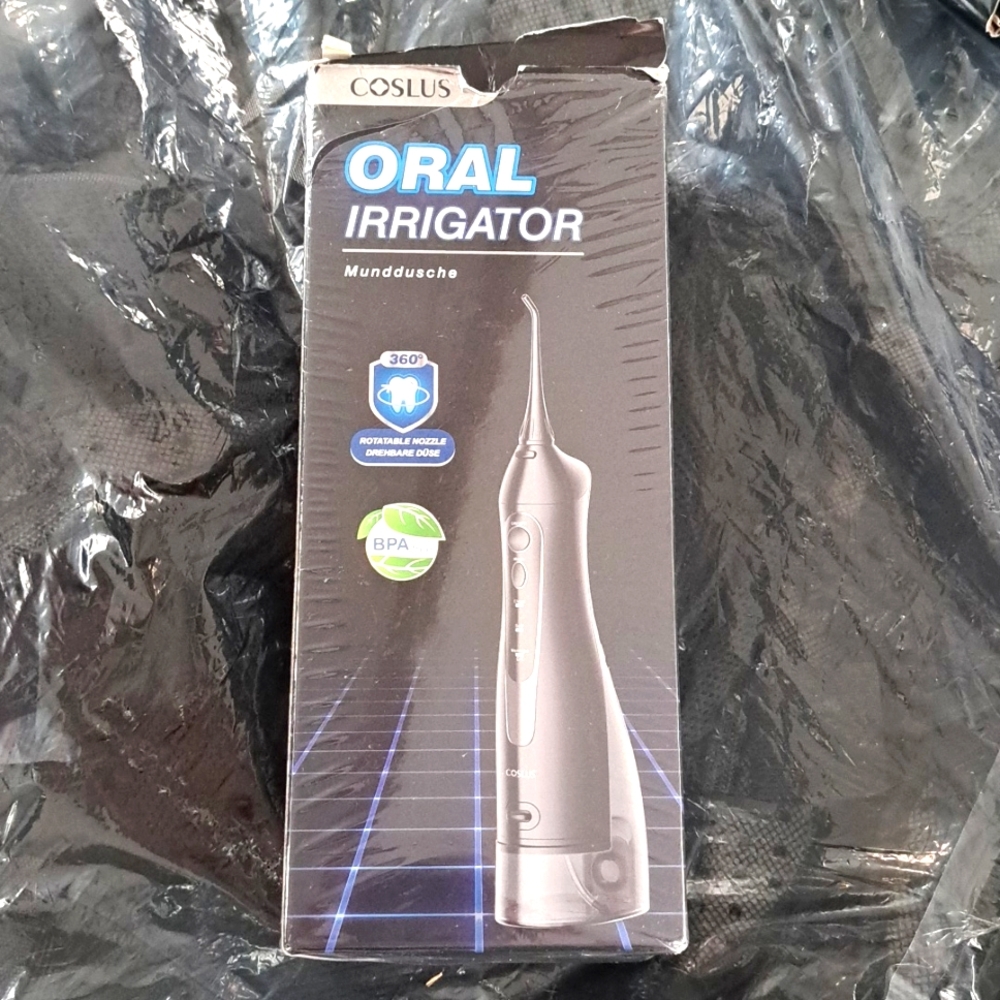 Oral irrigator